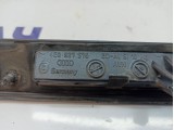Накладка крышки багажника Audi A8 4E0827576D. С фонарями подсветки номера. Дефект.