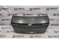 Крышка багажника Chevrolet Lacetti 96474985. Вмятина.