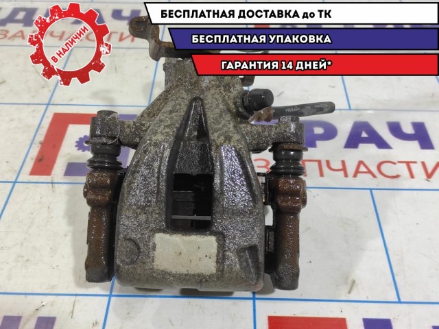 Суппорт тормозной задний правый Geely Emgrand EC7 1064001723. С колодками.