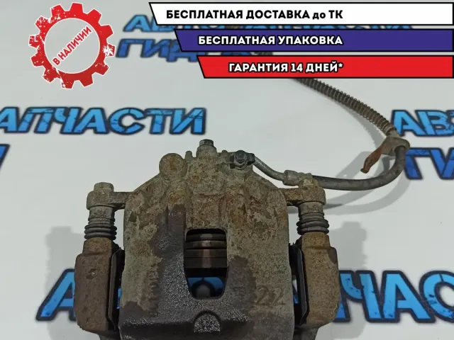 Суппорт тормозной передний левый Kia Rio 3 581104L000.