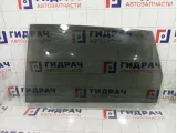 Стекло двери задней левой Kia Carens 0K2FB73510