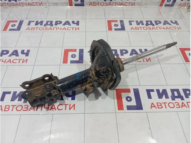 Амортизатор передний левый Kia Rio 546501G200