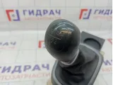 Кулиса КПП Kia Rio 3 437004Y300WK. Потертость.