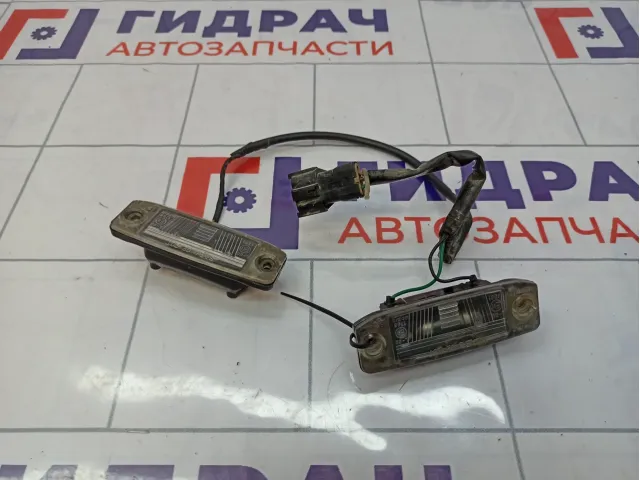 Фонарь подсветки номера Kia Sorento (XM) 92501-2P600