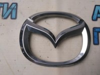 Эмблема решетки радиатора Mazda CX-7 EG2151731 Отличное состояние