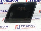 Стекло кузовное глухое правое Mitsubishi Airtrek MR574296