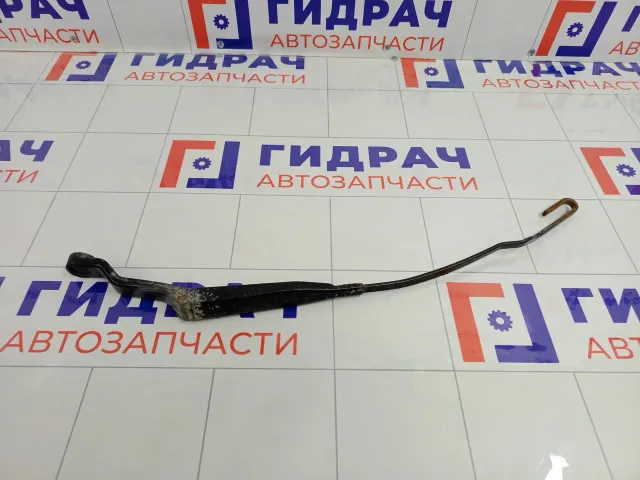 Поводок стеклоочистителя (Поводок дворника) левый Mitsubishi Carisma