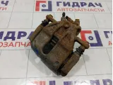 Суппорт тормозной передний правый Nissan Note 41001AX60A