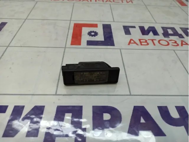 Фонарь подсветки номера Nissan Pathfinder 26510AU300