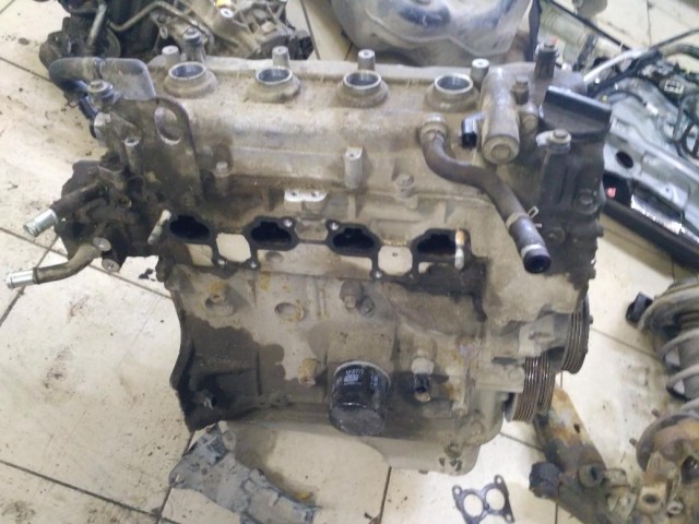 Двигатель QG18DE в сборе (дефект) Nissan Primera P12E 10102AU3SB Удовлетворительное состояние.После ДТП, обломлены крепления на блоке.