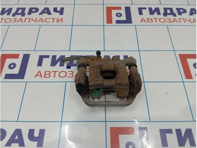 Суппорт тормозной задний левый Nissan Qashqai (J10) 44011-1KD0A