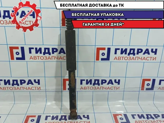 Амортизатор задний Nissan Tiida E6210-EC80A.