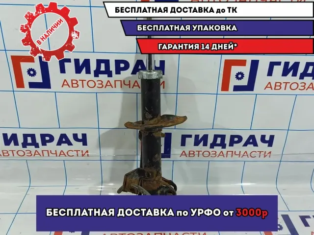 Амортизатор передний левый Nissan Tiida E4303-EC80A.