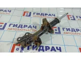 Амортизатор передний левый Nissan Tiida E4303-EC80A.