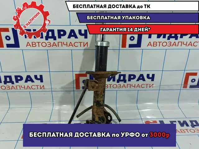 Амортизатор передний правый Nissan Tiida E4302-EC80A.