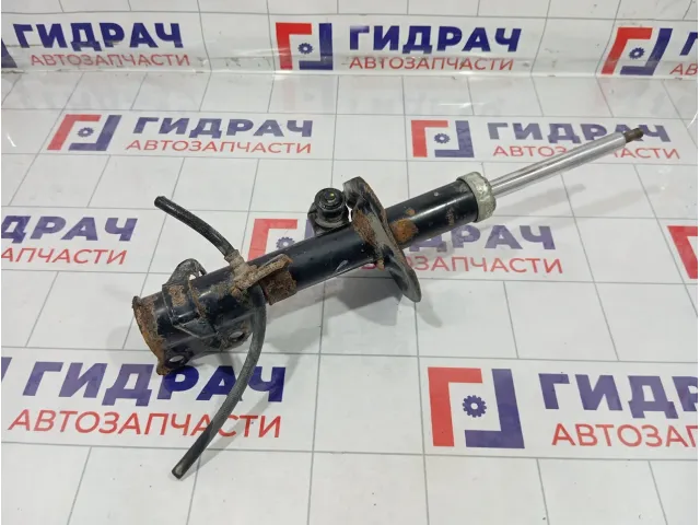 Амортизатор передний левый Nissan Tiida E4303EC80A