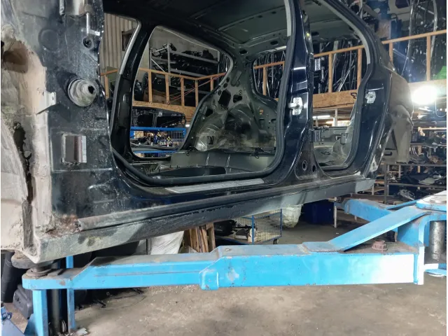 Порог со стойкой левый Opel Astra