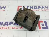 Суппорт тормозной передний правый Renault Scenic 7701207686