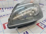 Фара левая Renault Symbol 7701057654
