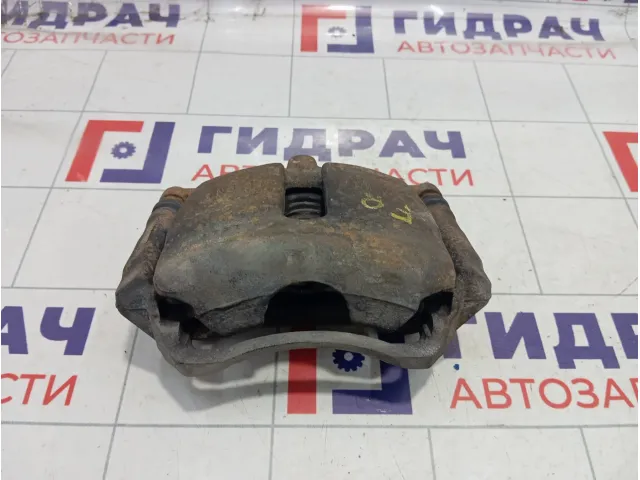 Суппорт тормозной передний правый Skoda Octavia (A7) 8V0615124