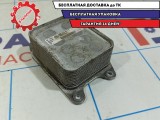 Радиатор масляный Skoda Rapid 04E117021K.