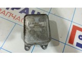 Радиатор масляный Skoda Rapid 04E117021K.