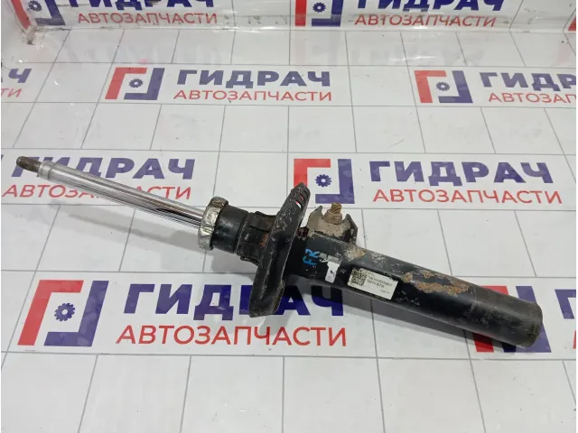 Амортизатор передний правый Skoda Yeti 1K0413031BL
