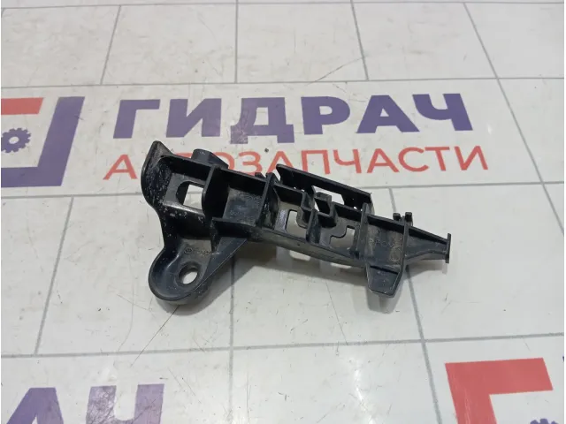 Кронштейн бампера задний правый Toyota Camry (XV70) 5256233060