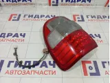 Фонарь задний наружный левый Toyota Land Cruiser 8156060480