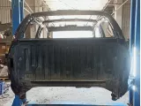 Панель задняя Toyota Tundra (XK50) 64101-0C090