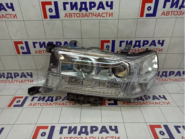 Фара левая Toyota Land Cruiser (200) 8115060J90