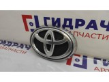 Эмблема решетки радиатора Toyota Hilux (GGN125) 753120K050.