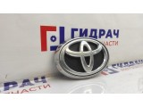 Эмблема решетки радиатора Toyota Hilux (GGN125) 753120K050.